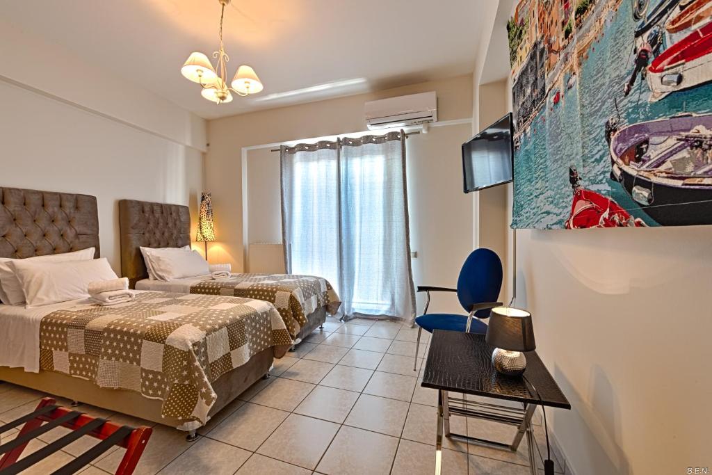 Posteľ alebo postele v izbe v ubytovaní Alexia's Apartments