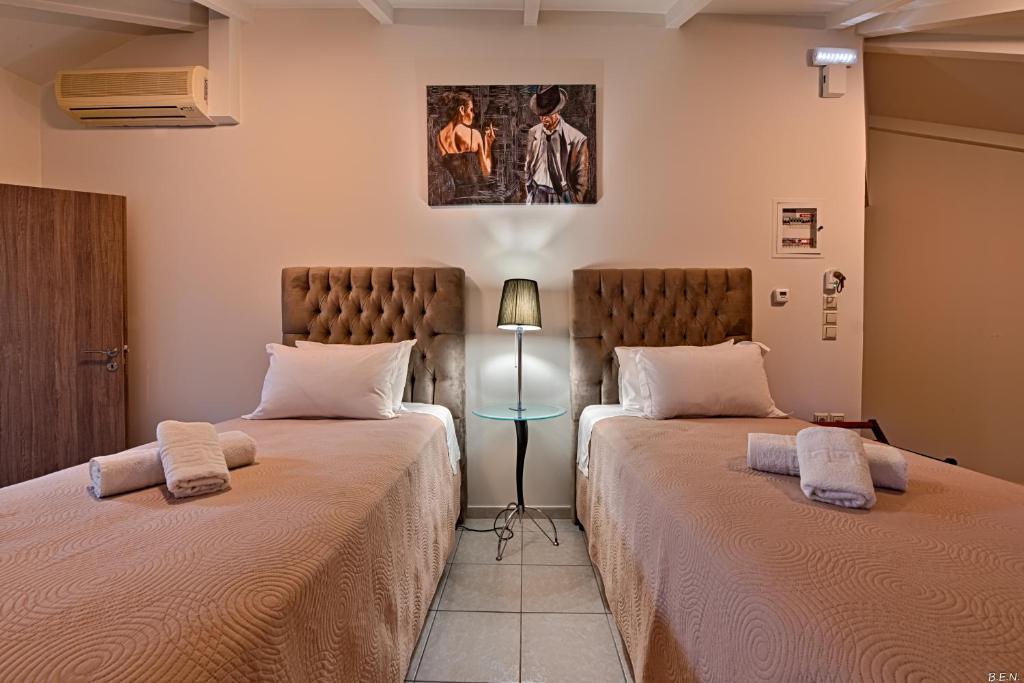 Posteľ alebo postele v izbe v ubytovaní Alexia's Apartments