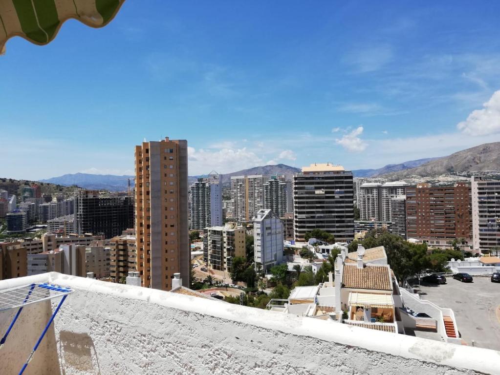 a view of a city from the roof of a building at Apartamento con wifi, mascotas bienvenidas in Benidorm