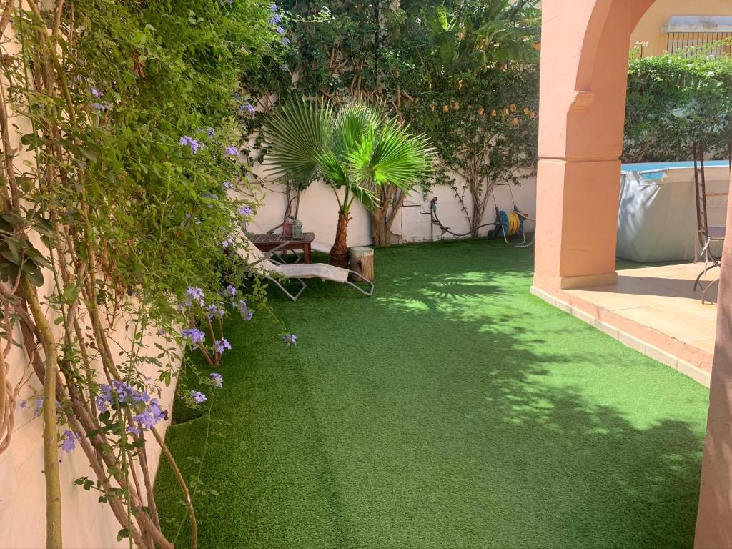 Ogród w obiekcie CASA 4 HABITACIONES CON JARDIN 10 Pax