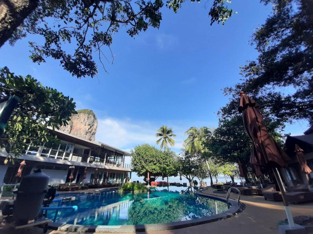 a swimming pool in front of a resort at Sand Sea Resort Railay Beach in Railay Beach