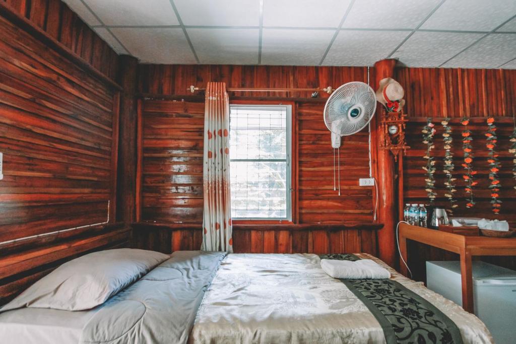 Postel nebo postele na pokoji v ubytování Akchanok Homestay