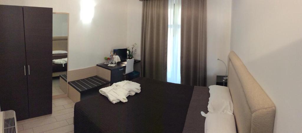 Postel nebo postele na pokoji v ubytování Hotel e trattoria San Giorgio