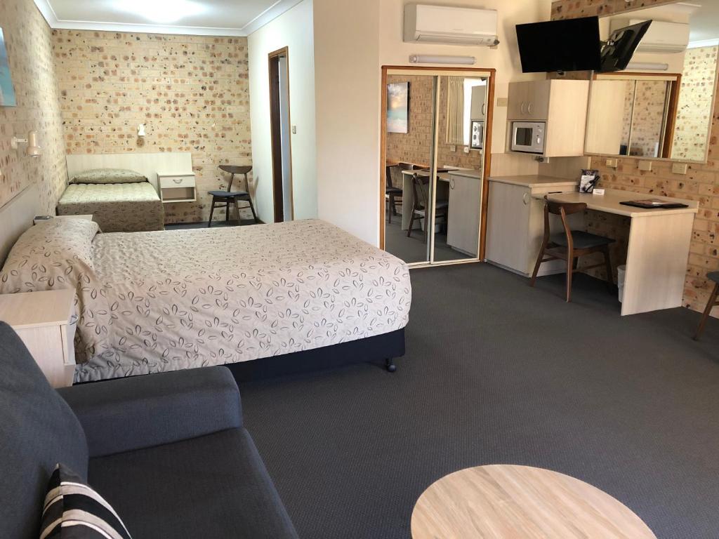 Kuchyň nebo kuchyňský kout v ubytování Cardiff Motor Inn