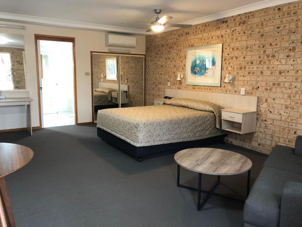 Postel nebo postele na pokoji v ubytování Cardiff Motor Inn