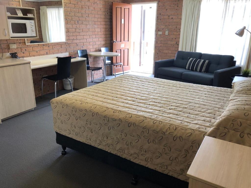 Kuchyň nebo kuchyňský kout v ubytování Cardiff Motor Inn