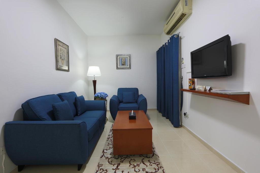 TV a/nebo společenská místnost v ubytování Nova Park Hotel