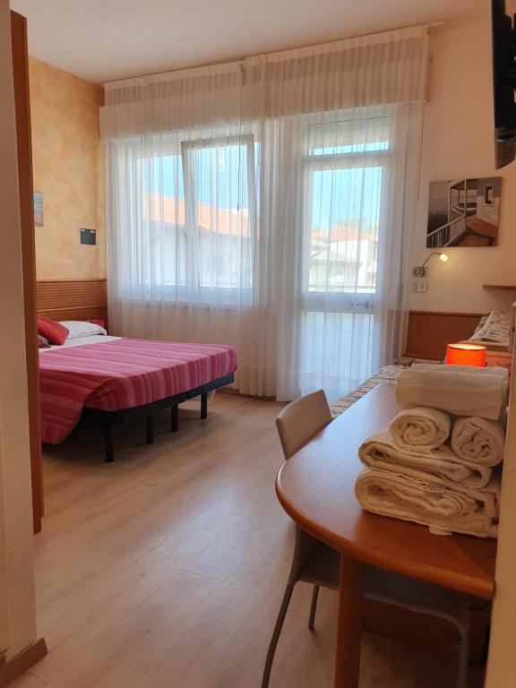 Postel nebo postele na pokoji v ubytování Hotel Nuova Graziosa
