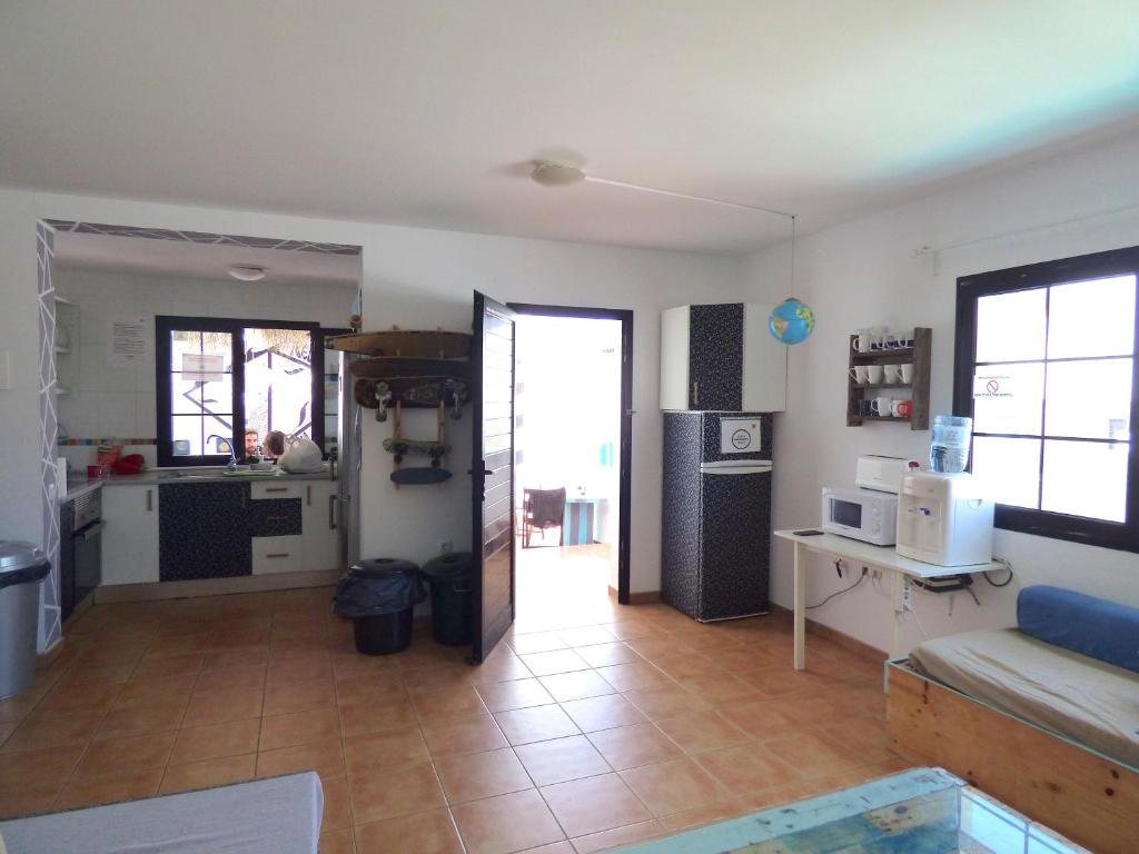 Kuchyň nebo kuchyňský kout v ubytování La Fresa Hostel