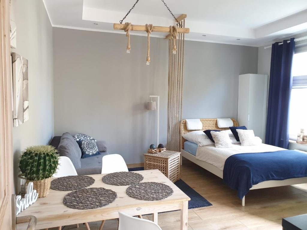 Posteľ alebo postele v izbe v ubytovaní JM Sopot Apartament Haffner