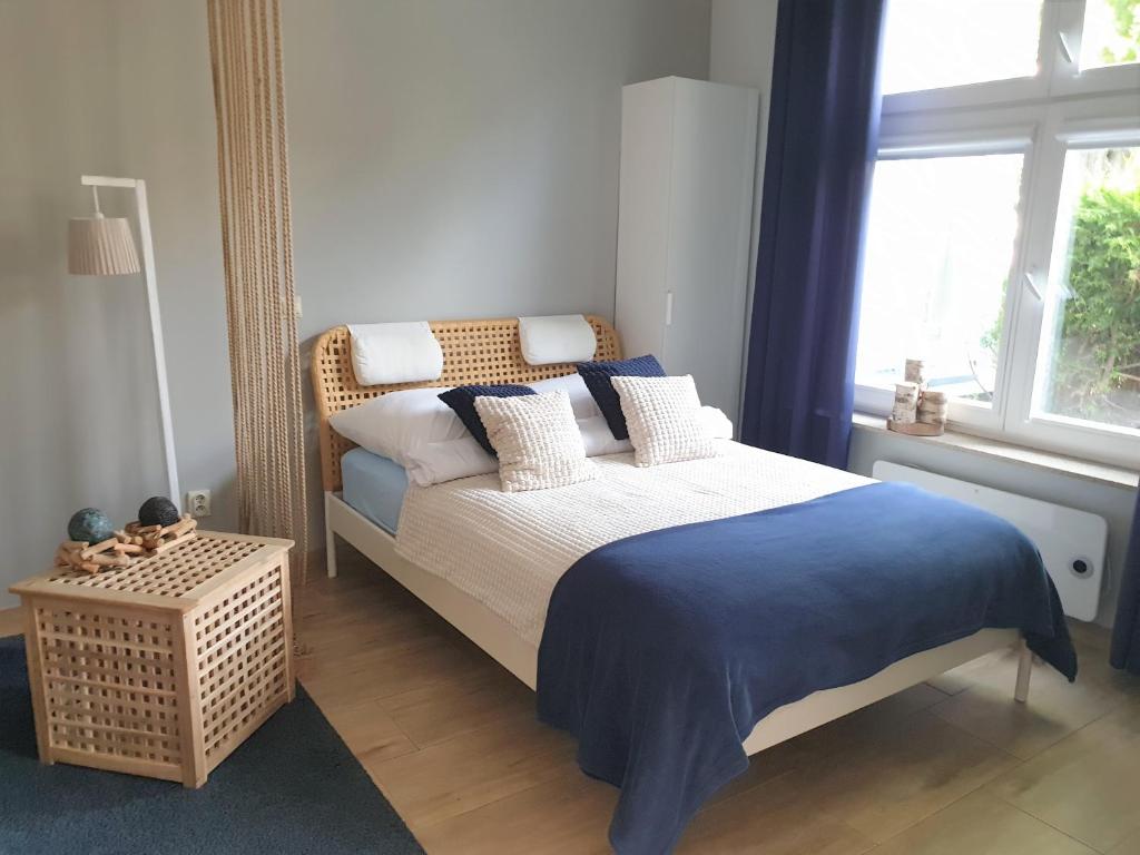 Posteľ alebo postele v izbe v ubytovaní JM Sopot Apartament Haffner