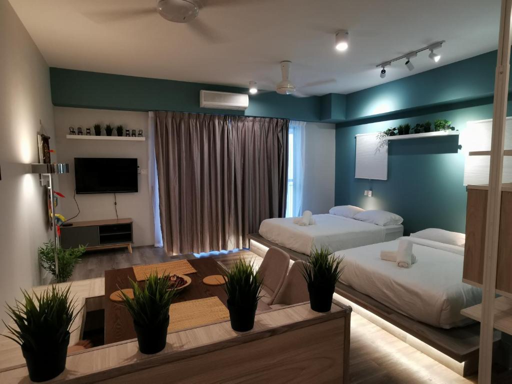 Postel nebo postele na pokoji v ubytování Zen at Midhills Genting