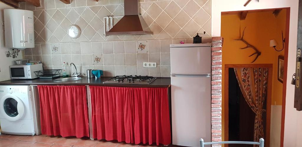 Kuchyň nebo kuchyňský kout v ubytování La Hacienda Del Campo