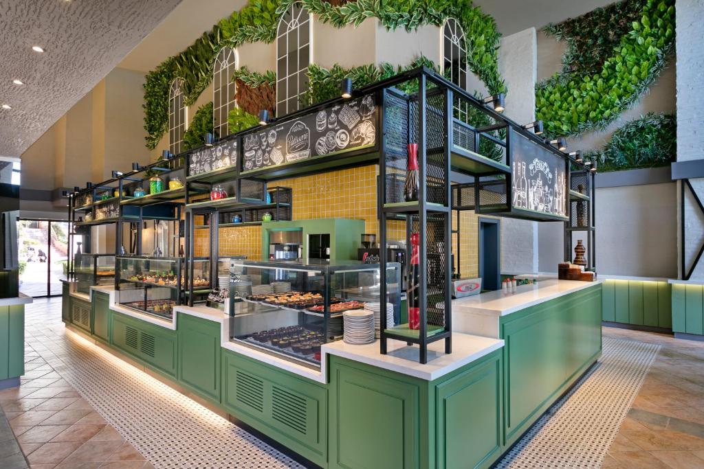 a bakery with a display case in a building at Limak Arcadia Sport Resort Belek in Belek