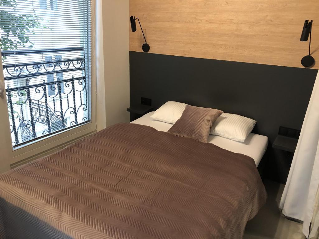 Posteľ alebo postele v izbe v ubytovaní Apartament Lena Stare Miasto