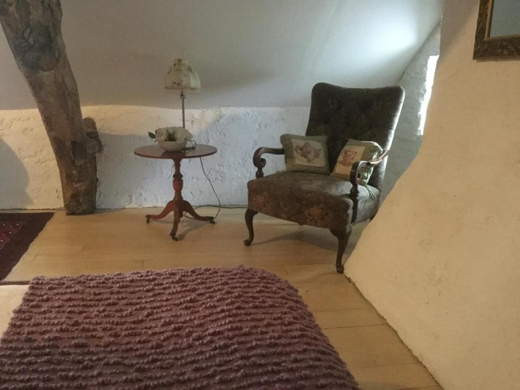 Posezení v ubytování Pérard Chambres D’Hotes