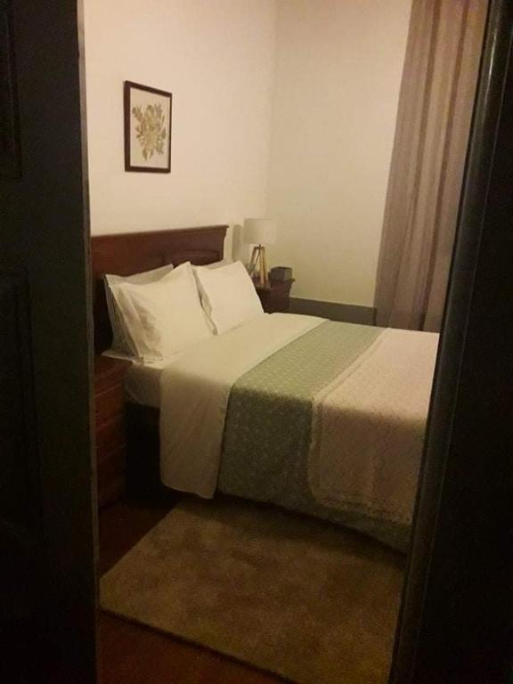 Postel nebo postele na pokoji v ubytování Quinta Casa Do Quintal