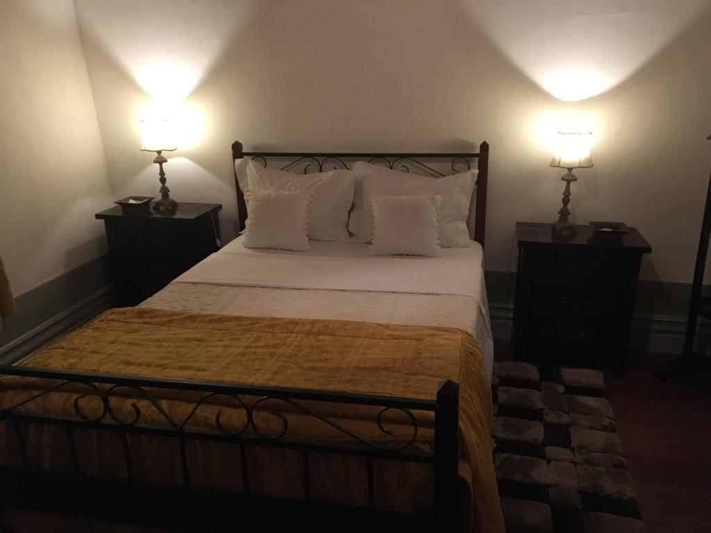 Postel nebo postele na pokoji v ubytování Quinta Casa Do Quintal