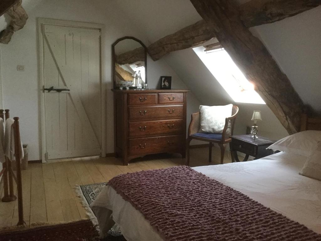 Postel nebo postele na pokoji v ubytování Pérard Chambres D’Hotes