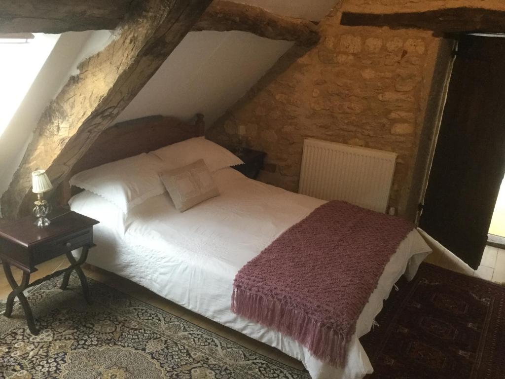 Postel nebo postele na pokoji v ubytování Pérard Chambres D’Hotes