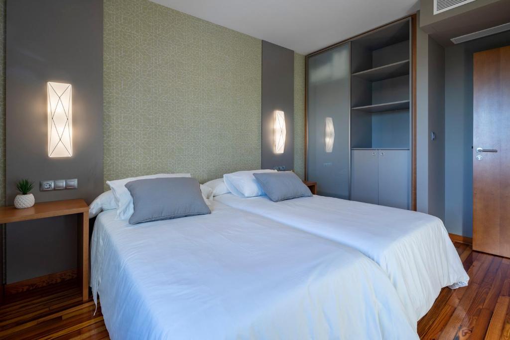 Ένα ή περισσότερα κρεβάτια σε δωμάτιο στο Casal do Marco
