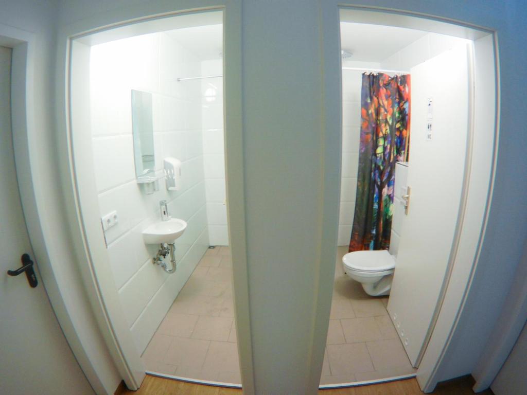 Koupelna v ubytování Hostel & Monteurzimmer bei Hansezimmer