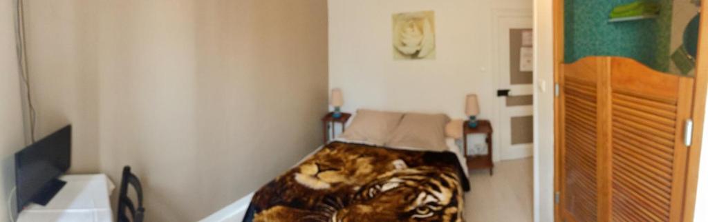 Postel nebo postele na pokoji v ubytování Hotel du Chemin de Fer