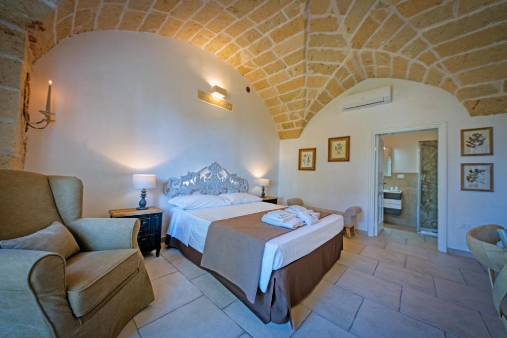 Postel nebo postele na pokoji v ubytování b&b Casale Vecchio Lecce