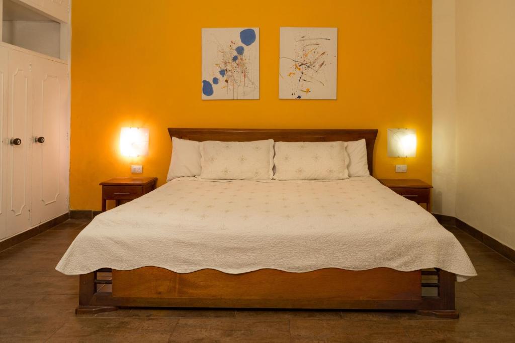 Postel nebo postele na pokoji v ubytování 61Prado Hotel