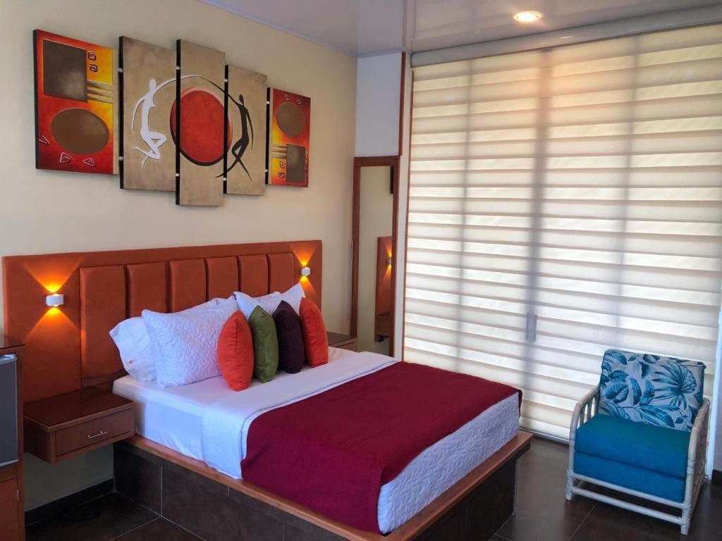 Postel nebo postele na pokoji v ubytování ATENEA SPA Hotel