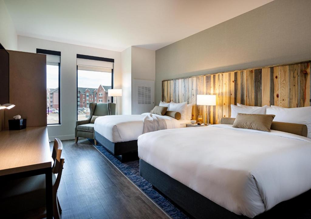 Postel nebo postele na pokoji v ubytování Hotel Maverick