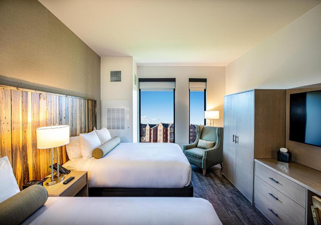 Postel nebo postele na pokoji v ubytování Hotel Maverick