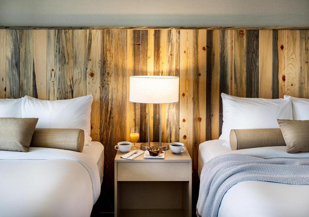 Postel nebo postele na pokoji v ubytování Hotel Maverick