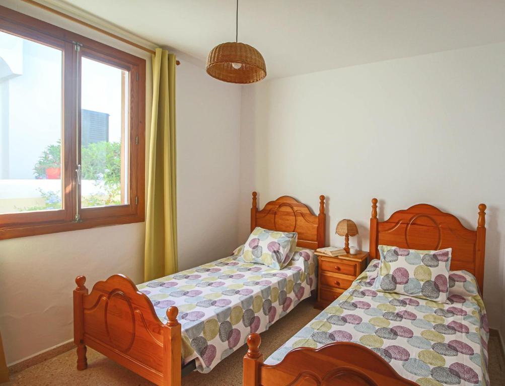 Postel nebo postele na pokoji v ubytování Can Gatet