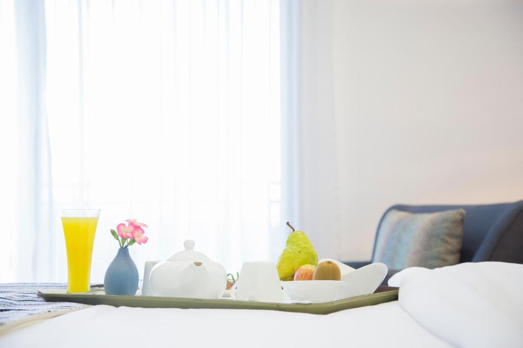 Postel nebo postele na pokoji v ubytování Amaryllis Hotel Blantyre