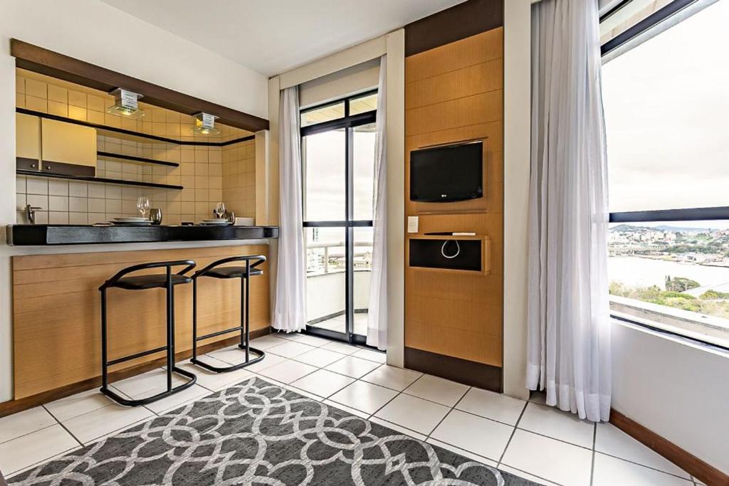  Apartamento em condomínio com infraestrutura completa e vista para ponte CA16