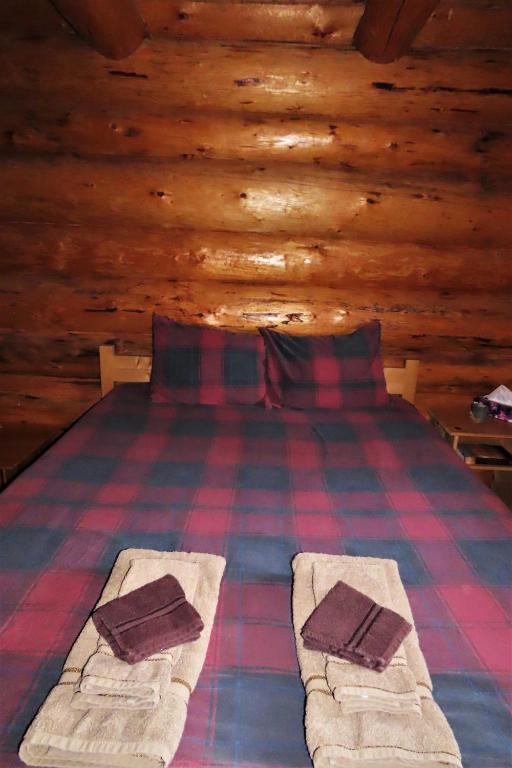Postel nebo postele na pokoji v ubytování Rocky Ridge Resort-BC