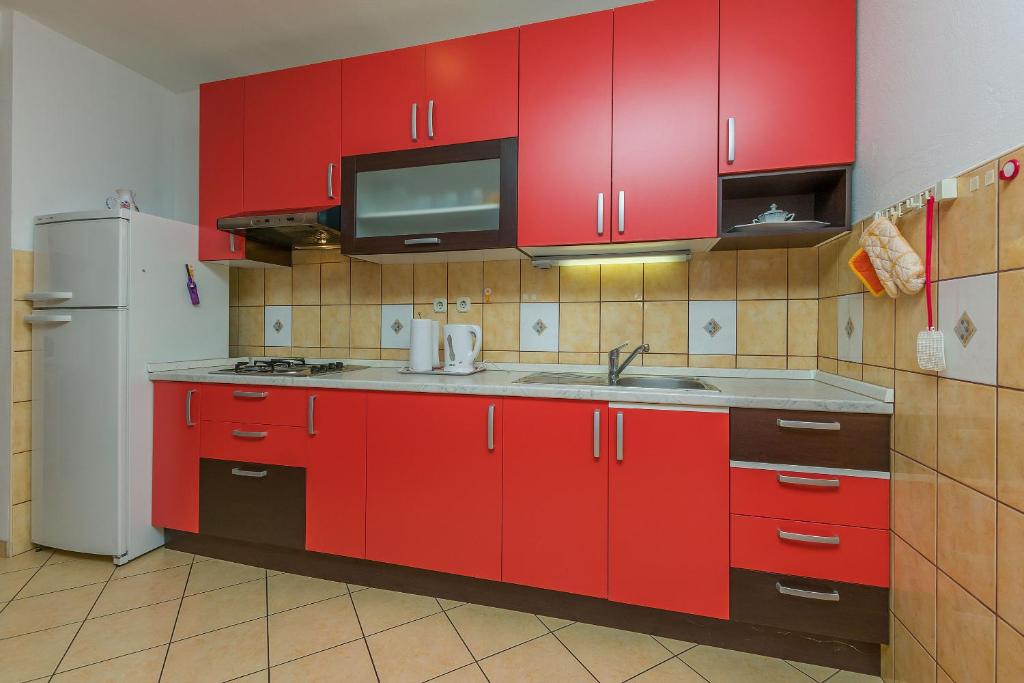 Kuchyňa alebo kuchynka v ubytovaní Apartments Dragana