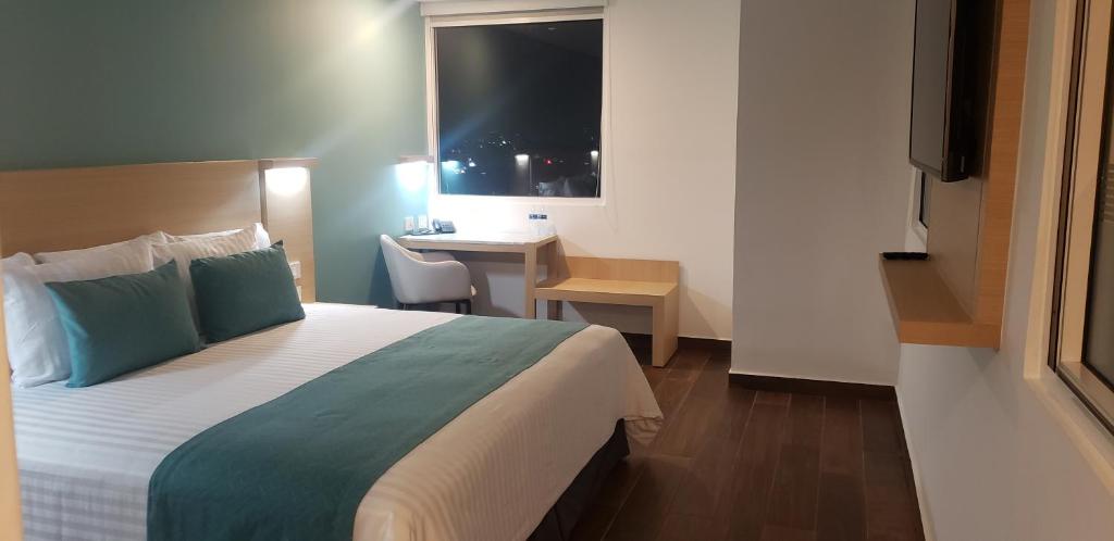 Postel nebo postele na pokoji v ubytování Hotel Plaza Sol Veracruz