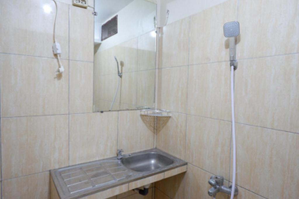 Koupelna v ubytování RedDoorz near RSUD Kudus