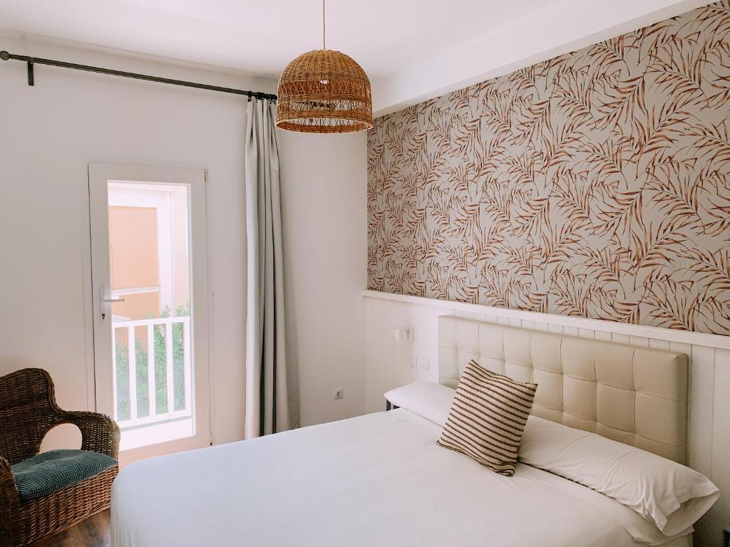Postel nebo postele na pokoji v ubytování Boutike Guesthouse