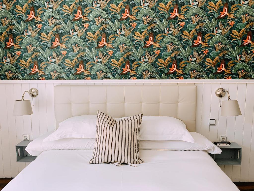 Postel nebo postele na pokoji v ubytování Boutike Guesthouse