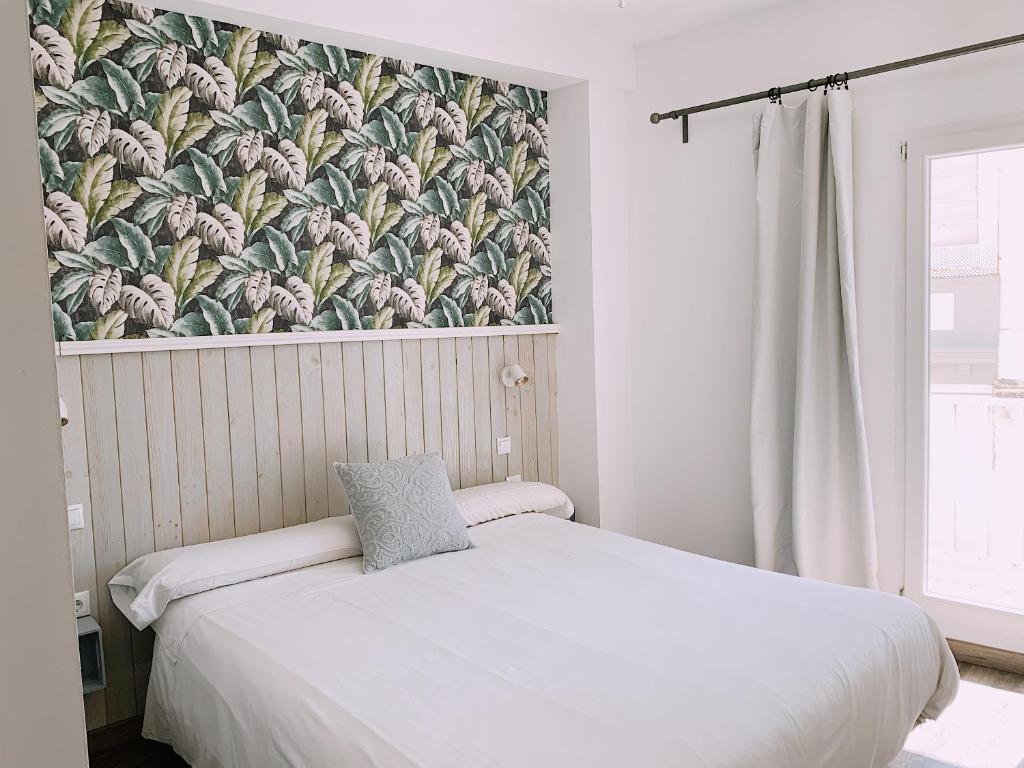 Postel nebo postele na pokoji v ubytování Boutike Guesthouse