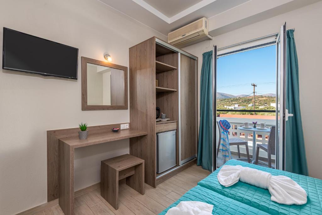 Postel nebo postele na pokoji v ubytování Sisi Breeze Hotel