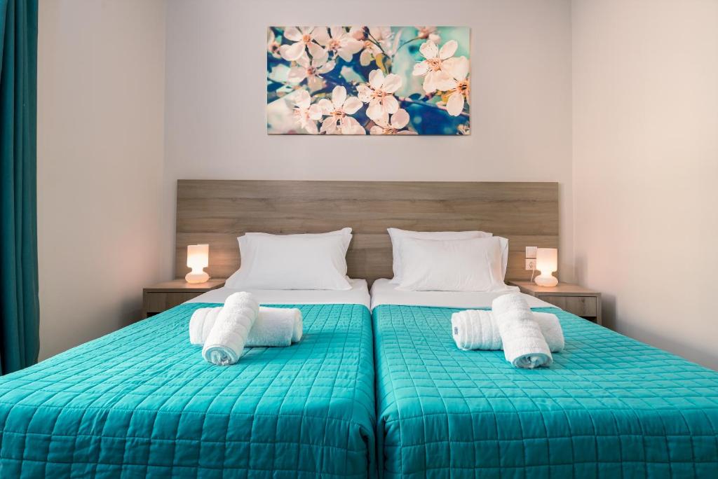Postel nebo postele na pokoji v ubytování Sisi Breeze Hotel