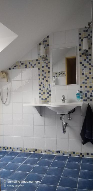 Koupelna v ubytování Sportház