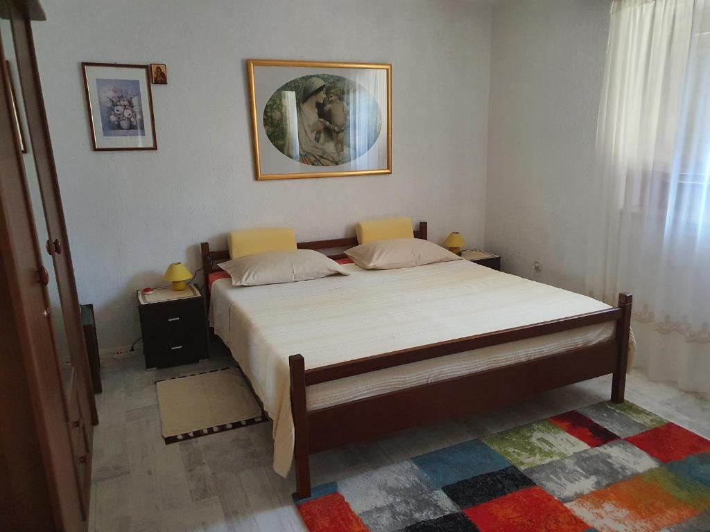 Postel nebo postele na pokoji v ubytování Apartments Palma