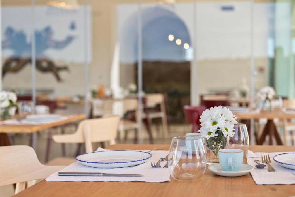 Reštaurácia alebo iné gastronomické zariadenie v ubytovaní Palummare - Agri Hotel Relais