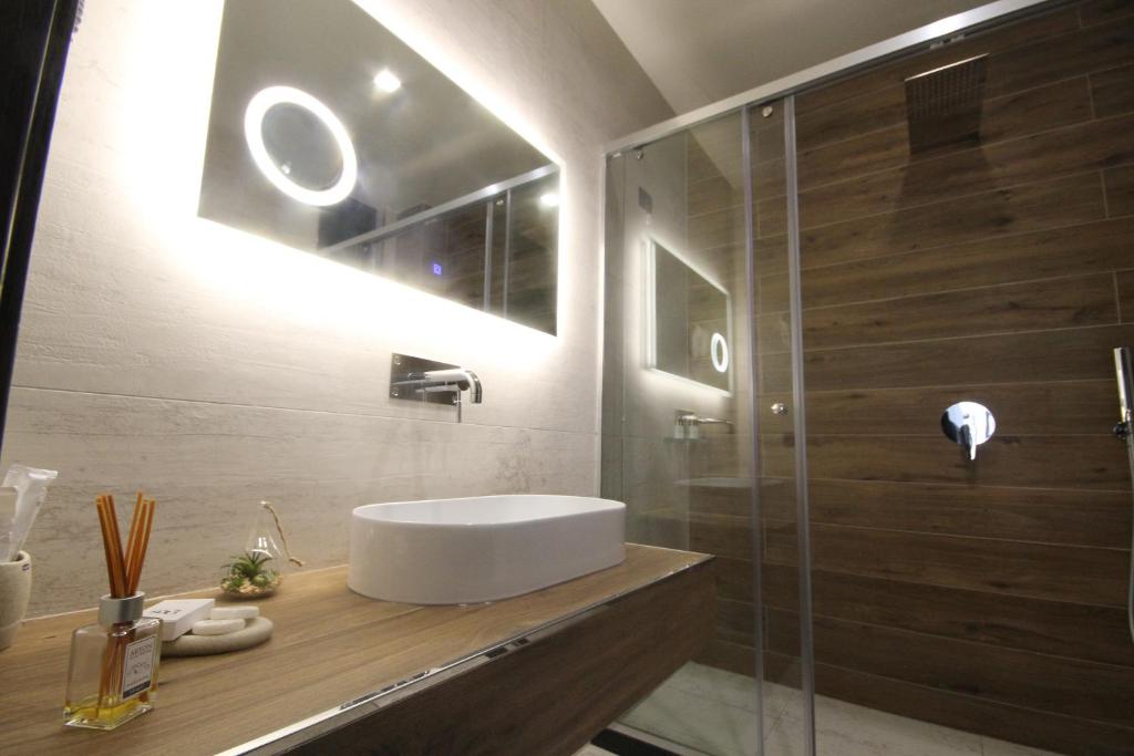 Koupelna v ubytování Albes Hotel