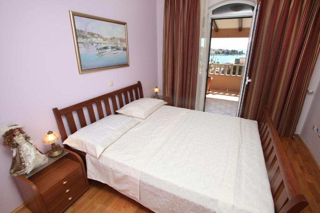 Postel nebo postele na pokoji v ubytování Villa Sun